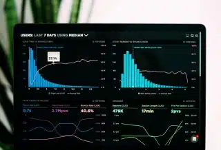 graphs of performance analytics on a laptop screen